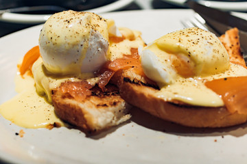 Poached eggs with smoked salmon on toast for brunch