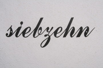 number of stainless steel in handwriting, german language, black,