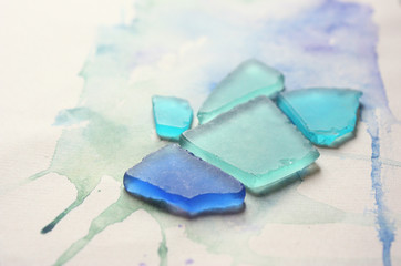 blue, white and dark blue glass on the table