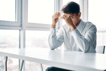 Fototapeta premium businessman looking at phone in office