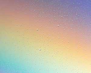 Water drops on a bright colored background. An abstract texture.