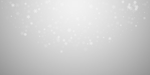 Sparse snowfall Christmas background. Subtle flyin