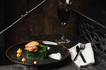 Grilled chicken breast, spinach, onions perfect mediterranean meal, Horizontal view