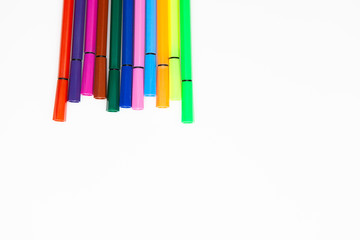 Felt-tip pens over white background
