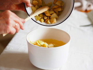 cook woman hands prepare cupcake pie in the kitchen
