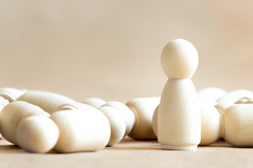 Wooden woman pawn wins the competition.