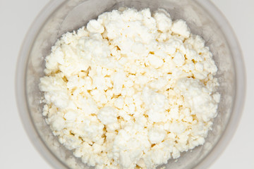 Cottage cheese isolated over white background