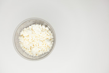Cottage cheese isolated over white background