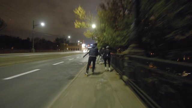 Night inline skating with motion blur