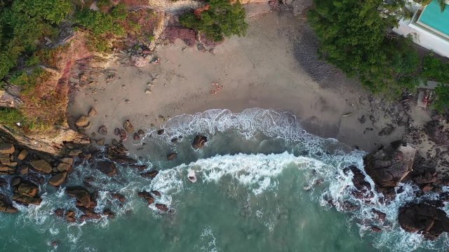 Aerial view on Amapas beach in Puerto Vallarta. Drone footage of sandy beach in Jalisco Mexico.