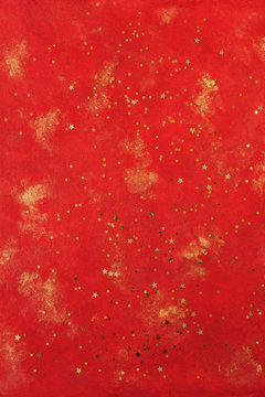 Red golden spotted background with stars glitter