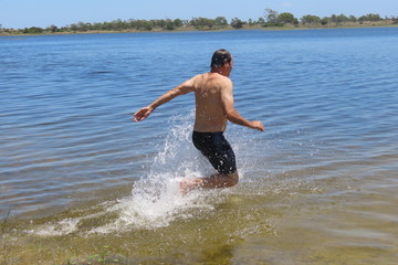 Fototapeta premium man on the beach