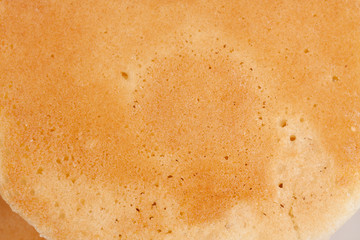 Closeup on texture of a British crumpet