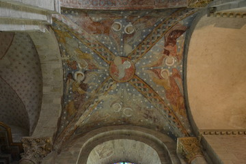 Covered with medieval Romanesque frescoes, the cross vault in the Basilica of Saint Sernin in Toulouse