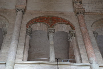 Romanesque arches and columns: the upper tier of the partition between the naves of the Basilica of San Sernin in Toulouse