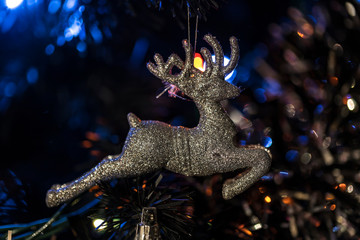 Reindeer Christmas ornament hanged on tree