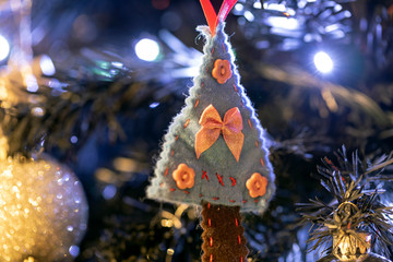 Hand made Christmas decoration hanged on tree