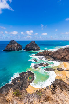 View of Morro dos Dois Irm&atilde;os and Baia dos Porcos in Fernando de Noronha, a paradisiac tropical island off the coast of Brazil