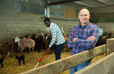 Portrait of man goat breeder