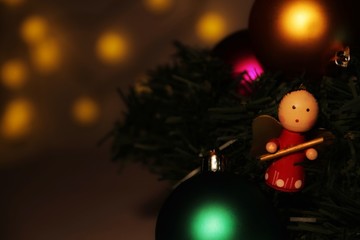 Fototapeta na wymiar Angel Christmas ornament , Christmas tree balls, garlands and other decorative elements