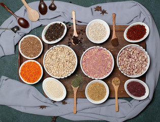  beans, pea, rice,  lace and herbs with wooden background