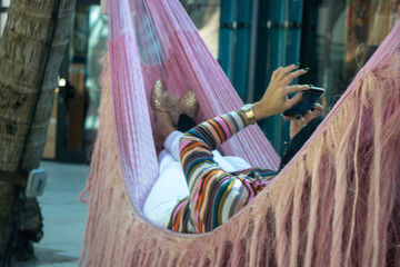 woman in pink hammock