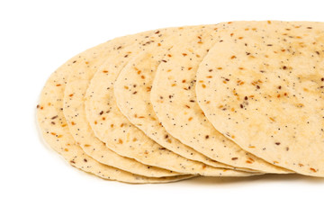 Pitta bread with seeds isolated on white