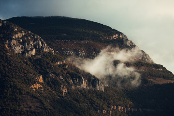 Mountains with fog at sunrise