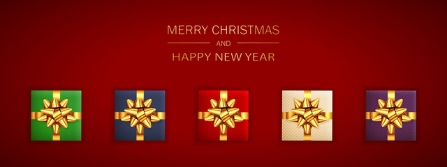 Christmas Gifts with Golden Holiday Bow on Red Background