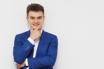 Young attractive person with nice expression. Young Businessman portrait with copy-space.