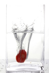 Fruit splash in a glass of water
