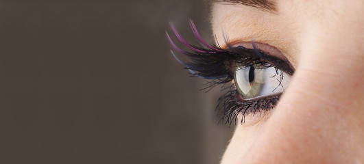beautiful female eye close up, looks away, vision correction concept, natural beauty with wrinkles,...