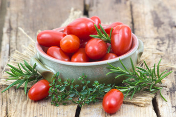 mini roma tomatoes and herbs
