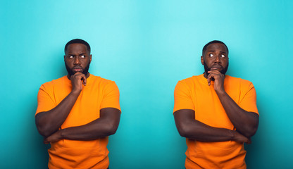 Black man with feelings of guilt is in doubt whit himself - obrazy, fototapety, plakaty