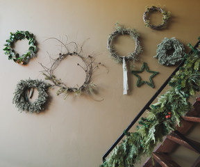 Wreath of spruce. Christmas decorations. Holiday concept. New Year holiday composition. Christmas wreaths in New Year interior.