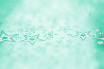 Festive stars and bokeh metal foil sheet in trendy green color