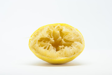 squeezed lemon on a white background