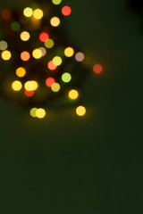  A fragment of a blurred image of a Christmas glowing garland