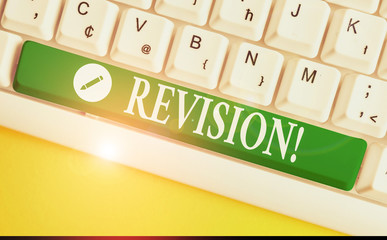 Writing note showing Revision. Business concept for action of revising over someone like auditing...