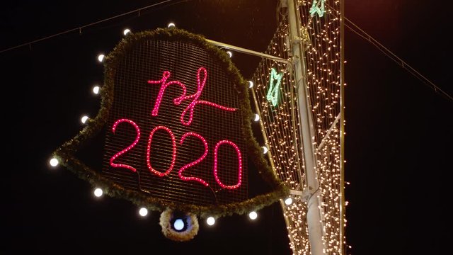 Pour feliciter 2020, christmas decoration with lights outside