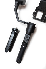 DSLR camera gimbal three-axis motorized stabilizer Tripod System on a white background, isolated