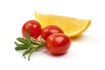 Fresh cherry tomatoes with rosemary, isolated on white background