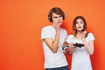 cheerful young couple in t-shirts