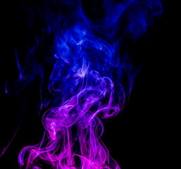 Colored smoke on black background