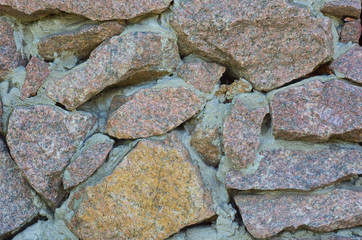  old wall of stones of different sizes and different colors