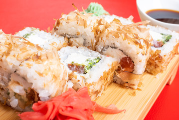 Dried tuna breading roll with various fillings. Close-up.