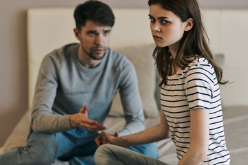 young couple using digital tablet at home