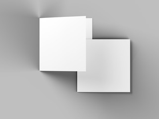 Brochure in square format folded to two - mockup. 3d illustration