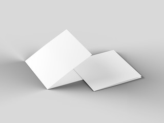 Brochure in square format folded to two - mockup. 3d illustration