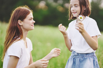 Fototapeta premium two woman and girl in the park